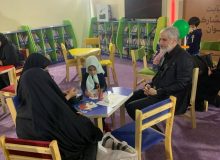 حضور معاون فرهنگی وزارت ارشاد در نمایشگاه قرآن به همراه خانواده